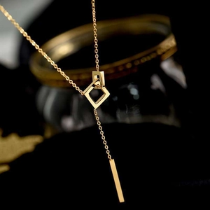 Minimalist 18k gold geometric interlocking square necklace with vertical bar pendant
