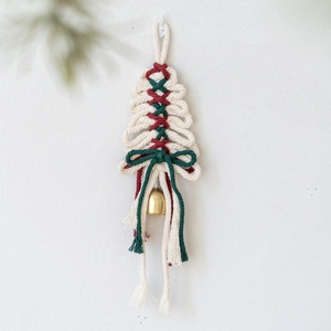 Handmade macrame Christmas tree ornament with festive red and green cotton rope and bell