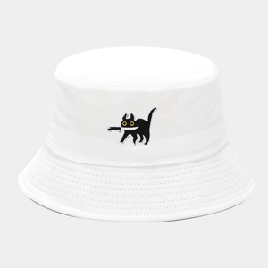 Close-up of funny black cat embroidery with knife on white cotton bucket hat