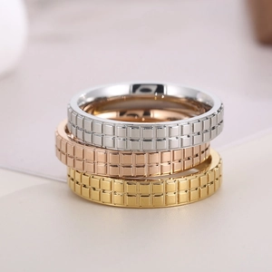 18k gold plated stainless steel rings with checkered pattern in gold silver and rose gold