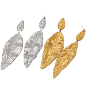 Minimalist stainless steel leaf drop earrings in gold and silver finish with leaf texture