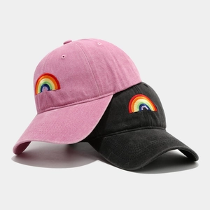 Black and pink rainbow embroidered cotton baseball caps with a vintage washed finish