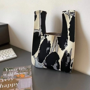 Minimalist large capacity knitted tote bag with abstract black and white ink pattern design