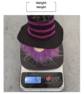 Mini Halloween gnome plush with purple beard and striped hat weighing 92g on a scale