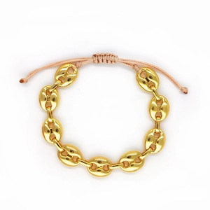 Verstellbares goldenes Kaffeebohnen Armband mit gewebter Kordel und Herz Anhänger