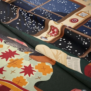 Macro shot showing soft velvet texture and detailed stitching on the bohemian tapestry
