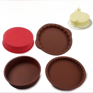 Close-up of heat-resistant silicone 7-hole round egg and pancake molds in red and brown