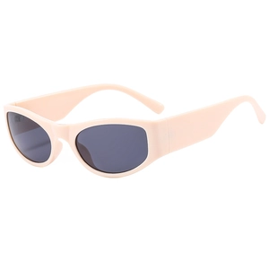 Retro cat-eye sunglasses with wide peach frames and dark grey lenses for women