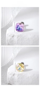 Detailed macro view of 8mm square faceted crystal earrings in pink and yellow aurora colors
