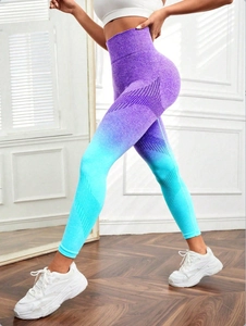 Detail of high waist purple to blue gradient seamless yoga leggings for women
