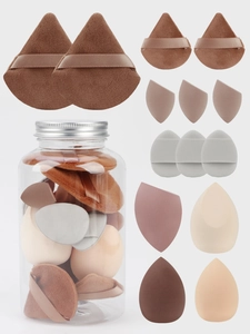 14-piece makeup sponge set with various shapes in a clear storage jar with silver lid
