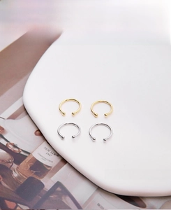 Set of four S925 sterling silver ear cuffs in polished gold and silver finishes