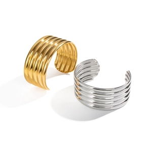 Minimalist wide striped open cuff bracelet in 18K gold and silver stainless steel
