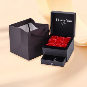 Preserved red rose jewelry gift box with heart necklace and black matching paper bag