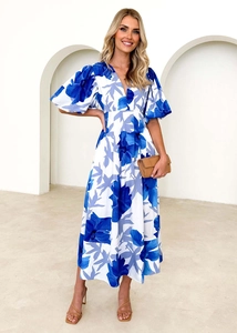 Detail of floral puff sleeve maxi dress with blue print on white woven fabric