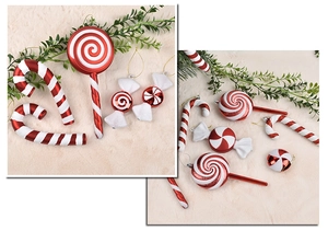 Detail of red and white striped Christmas candy cane ornaments with glitter finish