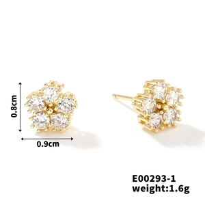Detail showing five-petal flower stud earrings with gold plating and clear zircons
