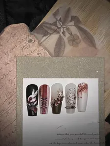 Detail of gothic dark rabbit hand-painted embossed long coffin press-on nail set