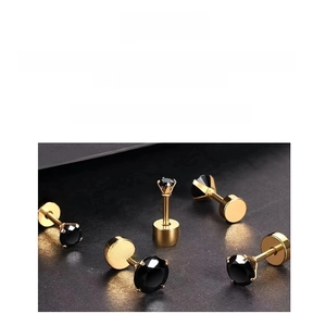 Detail view of 8mm black cubic zirconia earring with gold-plated four-claw setting