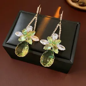 Elegant floral drop earrings with green zircon waterdrop pendants in a vintage luxury style
