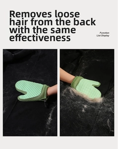 Detailed view of green silicone grooming glove removing cat hair from a black carpet