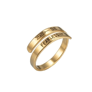 Detail shot of the gold Be Fearless inspirational engraving on the adjustable ring