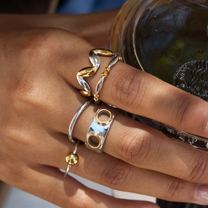 Fashionable gold and silver two-tone stackable ring set for women in stainless steel