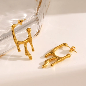 Polished gold liquid lava drop earrings in irregular fluid style for women fashion