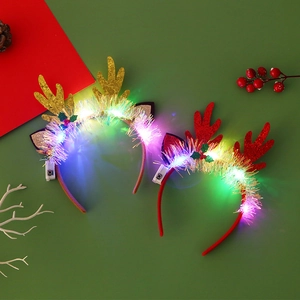 LED light-up Christmas antler headband with sequins and plush trim for festive parties