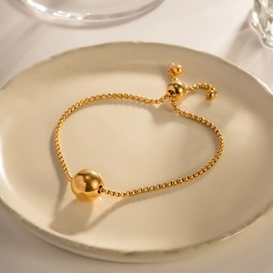Pulsera de cadena box ajustable chapada en oro de 18k con cuenta pulida reflectante