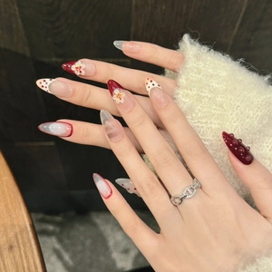 Handmade summer floral press-on nails with red and clear elegant design