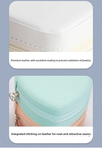 Detail of heart-shaped PU leather jewelry box showing neat stitching and zipper closure