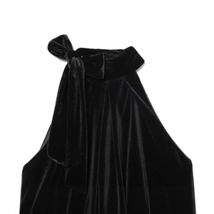 Elegant black velvet halter top with a prominent bow detail on a clean white background