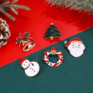 Set of five festive Christmas brooches including Santa and tree in vibrant enamel alloy