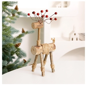 Artistic wooden reindeer decor with red berries and twine detail for Christmas