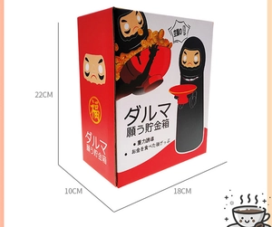 Detailed packaging dimensions 22x18x10cm of the electric Daruma themed piggy bank toy