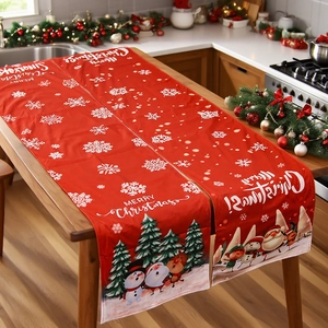 Christmas table runner with Santa and snowman motifs on a rustic wooden dining table