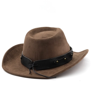 Detail of dark brown faux suede cowboy hat with bronze studs and leather decorative band