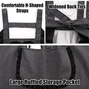 Black polka dot canvas apron with H-shaped straps and a decorative lace pocket