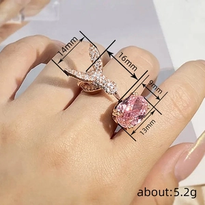 Adjustable hummingbird open ring with pink oval gemstone in rose gold finish