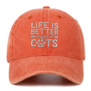Detail of coral cotton baseball cap with Life Is Better with Cats embroidery and paw icon