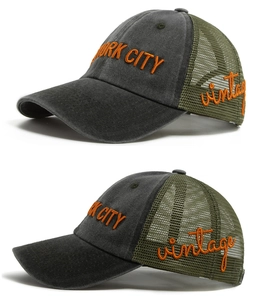 Detailed embroidery of NEW YORK CITY on vintage washed cotton and mesh trucker hat
