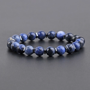 Men's natural blue sodalite stone bead bracelet with square spacer on black background