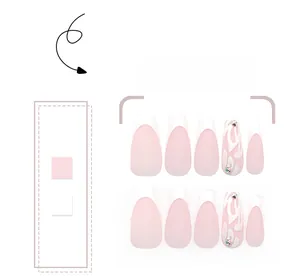Detail of long coffin press-on nails with French white tips and sparkling rhinestone accents