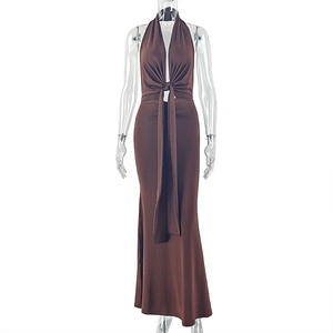 Detail of deep brown halter maxi dress with front lace-up waist and pleated bodycon fit