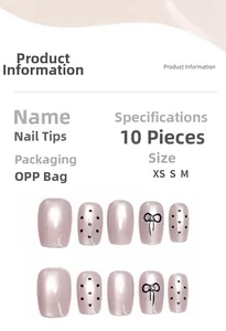 Detailed size guide for pink pearl press-on nails with black dots and bow accents