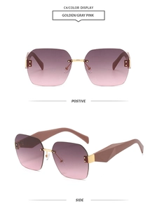 Detail of rimless square sunglasses with gold bridge and grey-pink gradient lenses