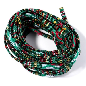 Macro detail of 5mm flat cotton core cord with colorful ethnic pattern for DIY jewelry crafts