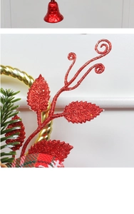 Close-up of Christmas bell ornament featuring red sequins, pine needles, and plaid ribbon