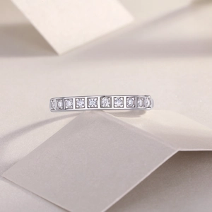 Macro shot of silver S925 sterling silver ring with sparkling moissanite pavé stones